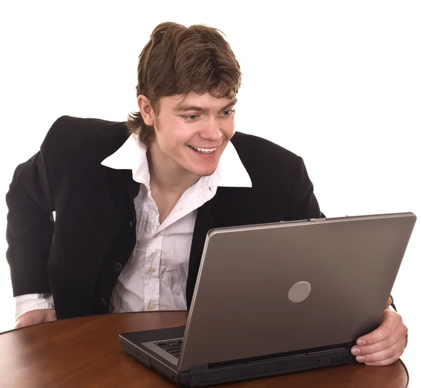 Бізнесмен з ноутбуком в офісі . — стокове фото