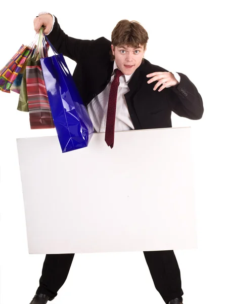 Businessman with shopping bag and banner. — Stock Photo, Image