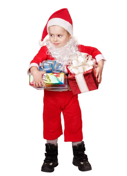 Dítě v kostýmu santa drží krabičky. — Stock fotografie