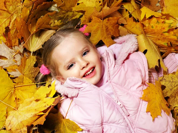 Kid in autumn orange leaves. — Stok fotoğraf