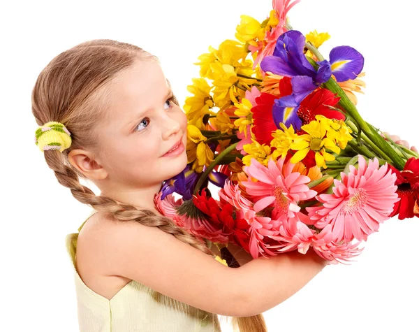 Criança feliz segurando flores . — Fotografia de Stock