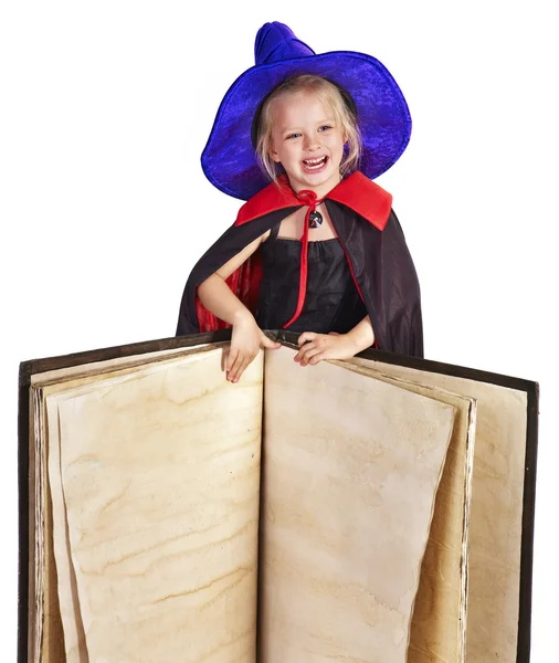 Bruja niño sosteniendo libro . — Foto de Stock
