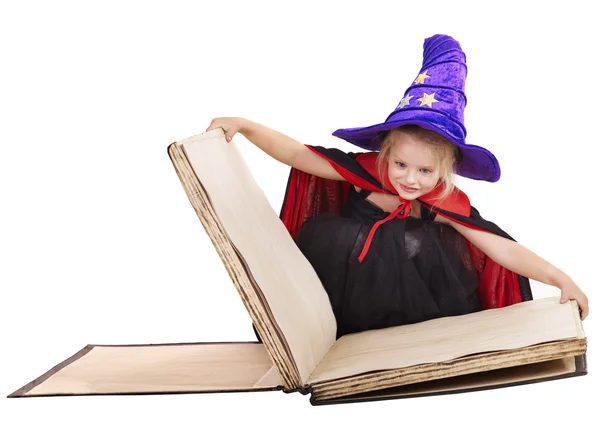 마녀 아이 들고 책. — 스톡 사진