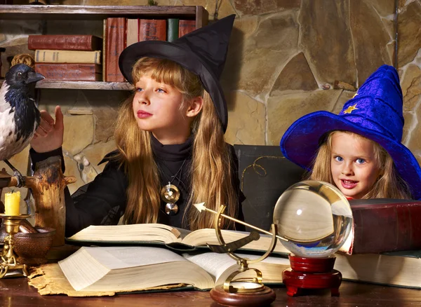 Witch kid with crystal ball. — Stock Photo, Image