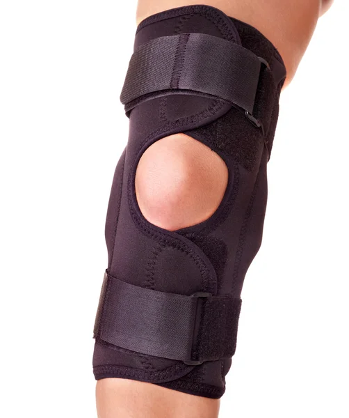Trauma of knee in brace. — Stock Photo, Image
