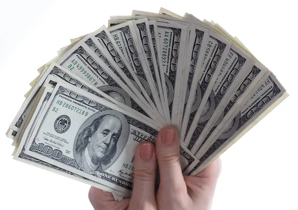 Στοίβα χρήματα στο γυναικείο χέρι. — Φωτογραφία Αρχείου