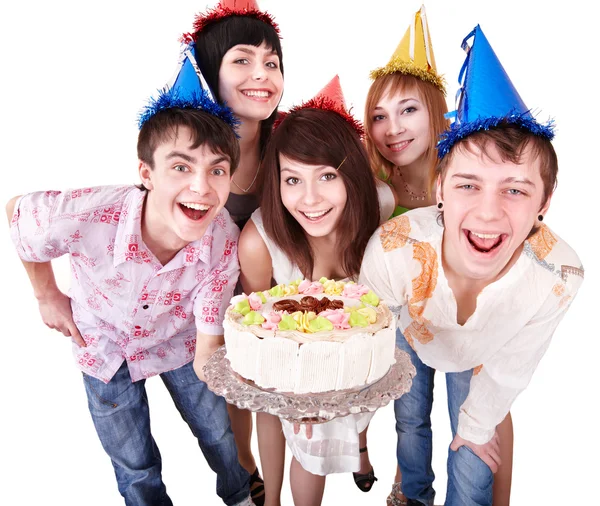 Groupe dans chapeau de fête manger gâteau . — Photo