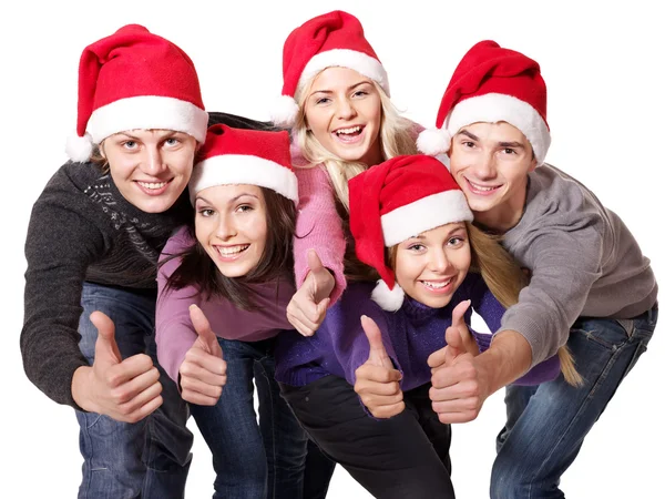 Gruppe jung mit Weihnachtsmann-Hut zeigt Daumen nach oben. — Stockfoto