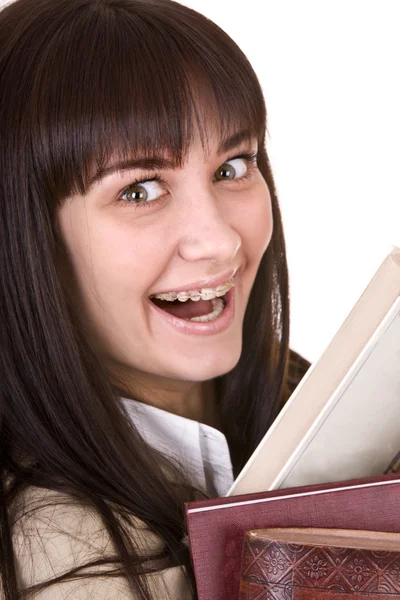 Умная девушка в брекете с кучей книг . — стоковое фото