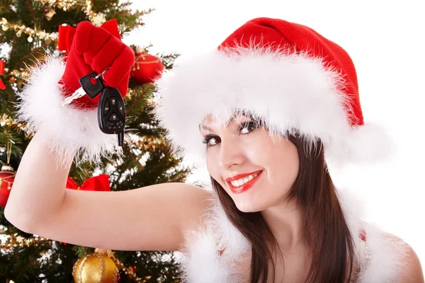 Boże Narodzenie dziewczyna w santa hat trzymając auto klucze. — Zdjęcie stockowe