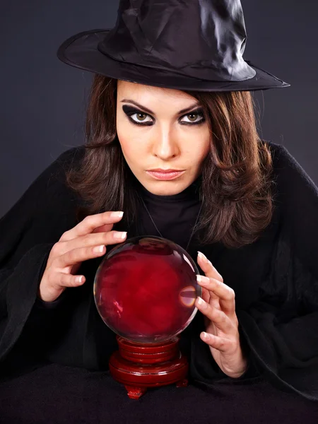 stock image Young woman with crystal ball.