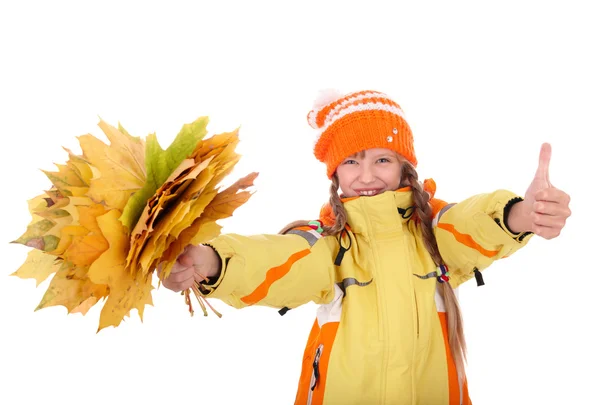 Girl in autumn orange hat holding leaves. — Stock Photo, Image