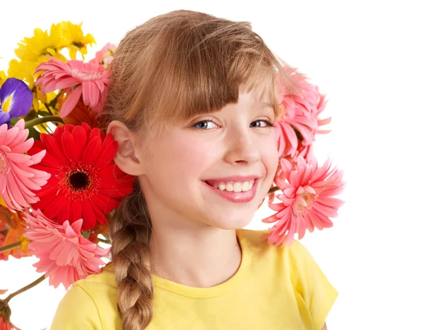 Criança com flores no cabelo . — Fotografia de Stock