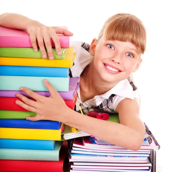 Školní dítě drží Stoh knih. — Stock fotografie