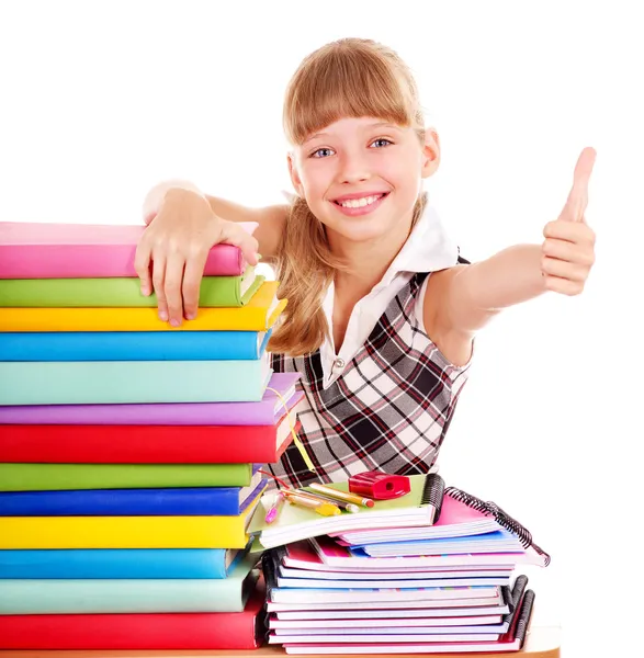 Criança com pilha de livros e mostrando o polegar para cima . — Fotografia de Stock