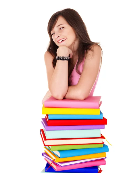 Dziewczyna z kolorowych kupie książki . — Zdjęcie stockowe