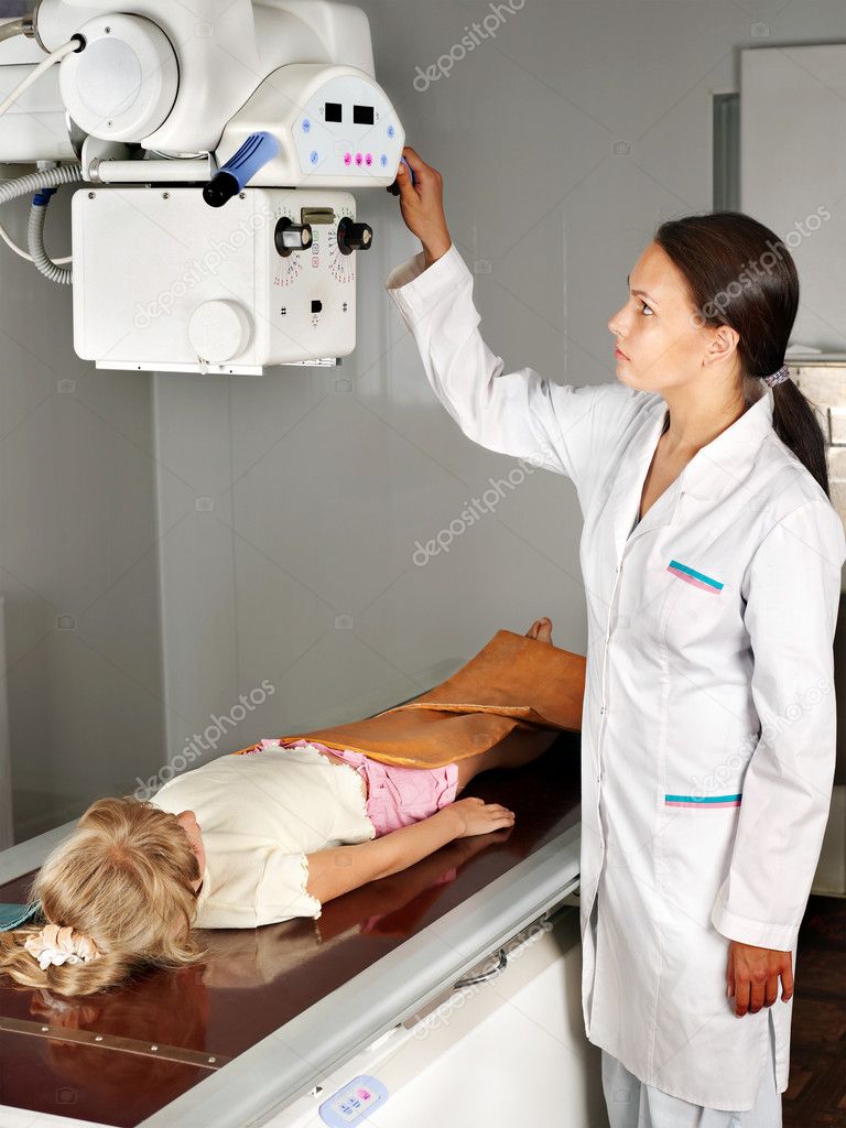 Child with doctor radiologist.