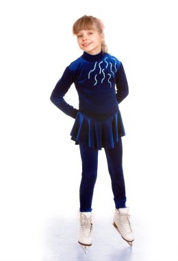 Girl in blue sport dress on skates.