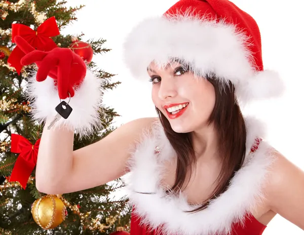 Kerstmis meisje in Kerstman hoed auto sleutels houden. — Stockfoto