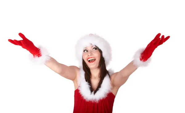Kerstmis meisje in rode kerstmuts met hand omhoog. — Stockfoto