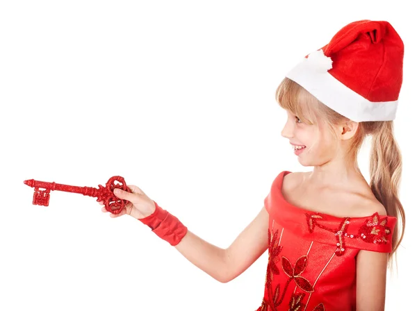Kind in Kerstman hoed, bedrijf rode luxe-geschenketui. — Stockfoto