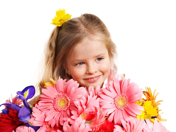 Счастливый ребенок с цветами . — стоковое фото