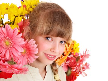 Child with with flowers on her hair. clipart