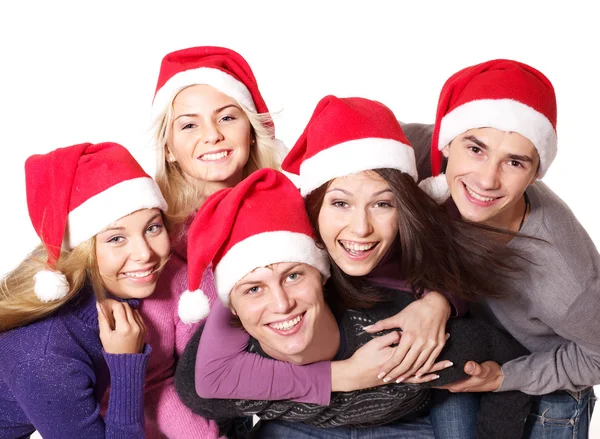 Gruppo giovane in cappello Babbo Natale  . — Foto Stock