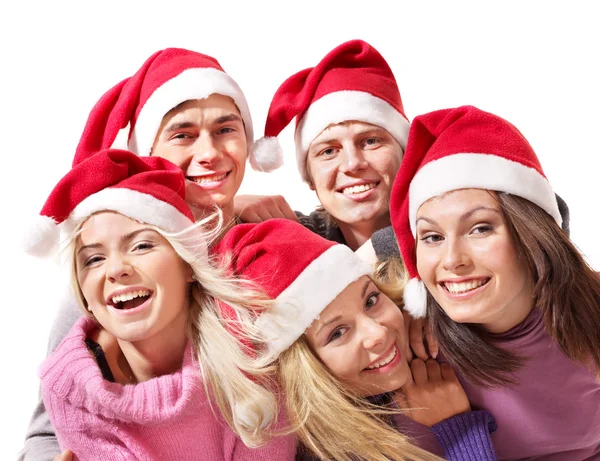 Noel Baba şapkası içinde genç grup . — Stok fotoğraf