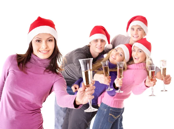 Groep jonge in Kerstman hoed — Stockfoto