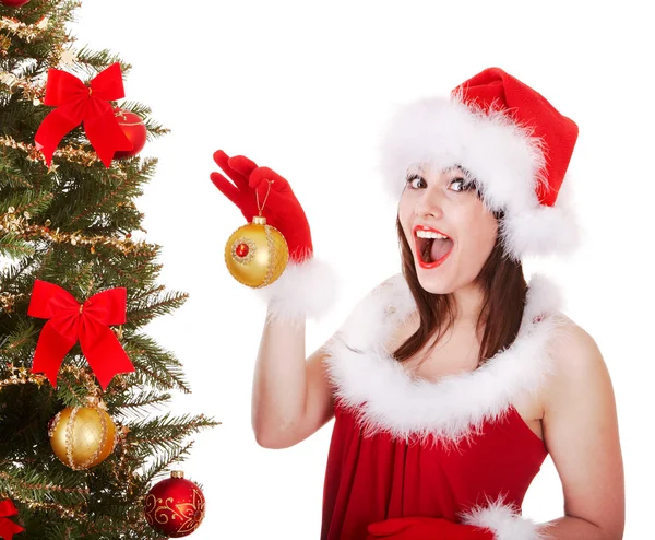 Noel Baba şapkası ile çam ağacı Noel kız. — Stok fotoğraf
