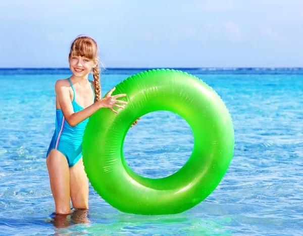 Child holding inflatable ring.. — Stock Photo, Image