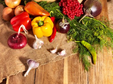 Vegetable on wooden boards. clipart