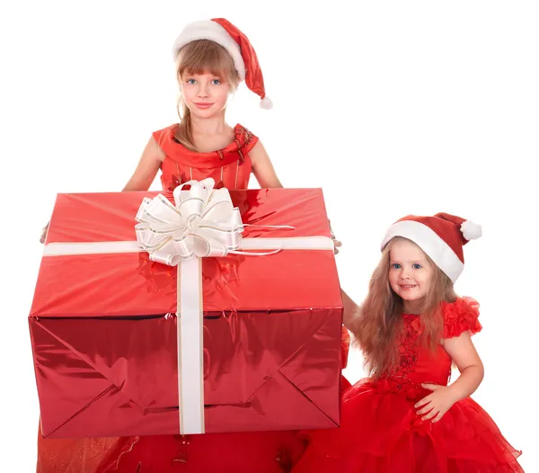Children in santa hat holding gift box. — Stock Photo, Image