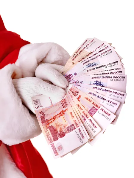 Santa Claus hand with money (Russian rouble). — Stock Photo, Image