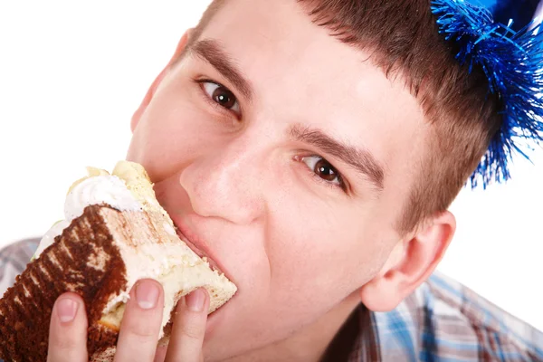 Ansiktet på mannen äter tårta. — Stockfoto