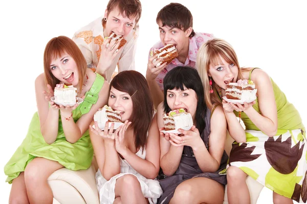 Skupina happy mladých s dortem. — Stock fotografie