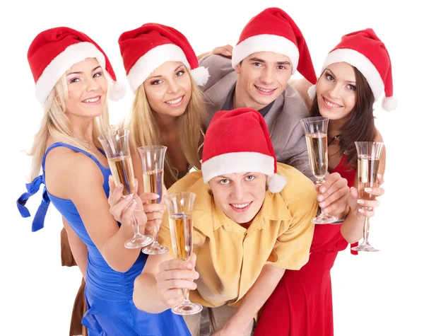 Noel Baba şapkası içinde genç grup. — Stok fotoğraf
