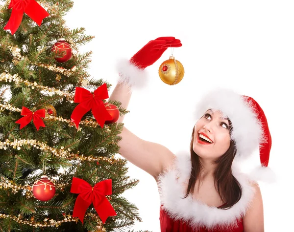 Chica en santa hat decorete árbol de navidad . — Foto de Stock