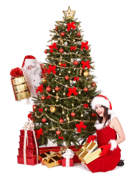 Papai Noel e menina pela árvore de natal  . — Fotografia de Stock