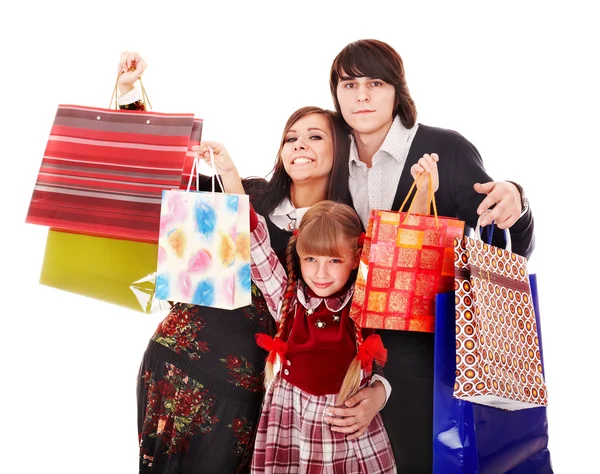 Glückliche Familie und Kind mit Einkaufstasche. — Stockfoto