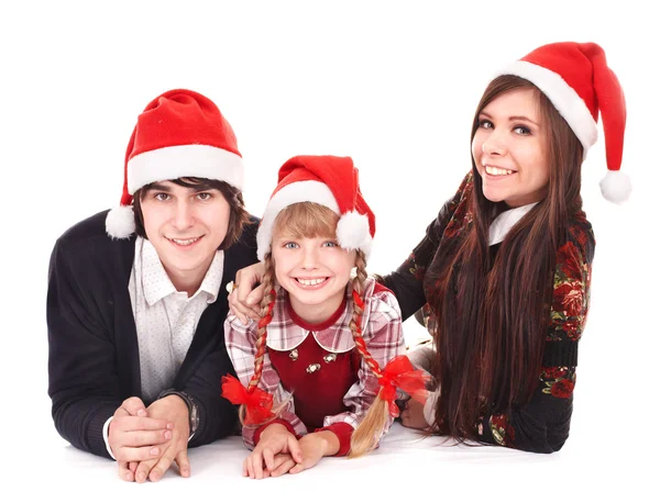 Lycklig familj med barn i santa hatt. — Stockfoto