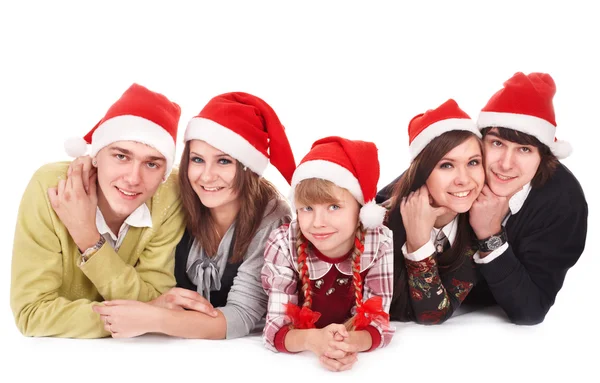 Ευτυχισμένη οικογένεια με παιδί με το καπέλο santa. — Φωτογραφία Αρχείου