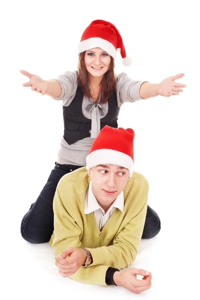夫妇在圣诞老人帽子. — 图库照片