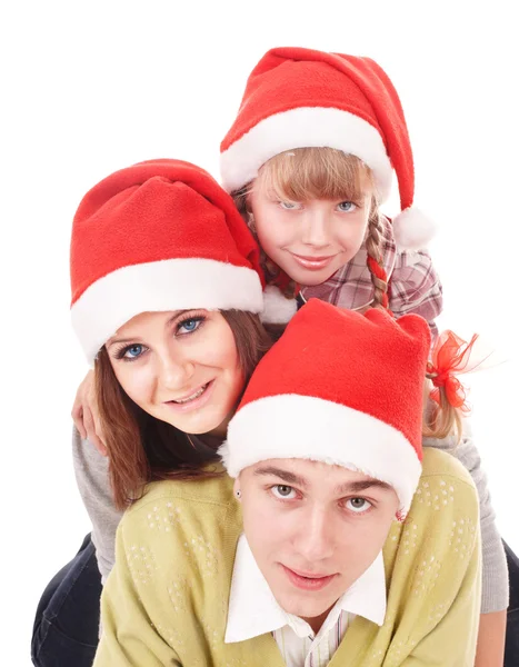 Gelukkige familie met kind in Kerstman hoed. — Stockfoto