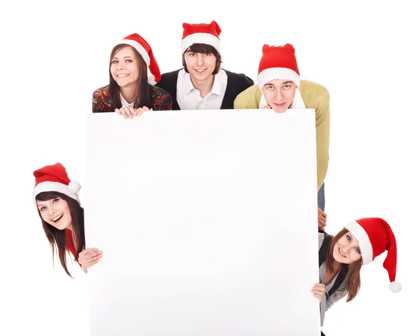 Happy group in santa hat whith banner. — Stock Photo, Image