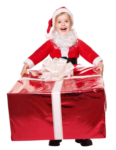 Child in santa costume holding gift box. — Stock Photo, Image