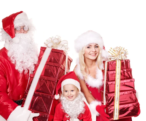 Weihnachtsmann Familie mit Kind hält Stapel Geschenkschachtel.. — Stockfoto