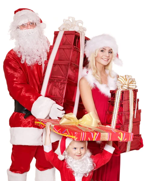 Семья Санта-Клауса с ребенком, держащим стопку подарков .. — стоковое фото