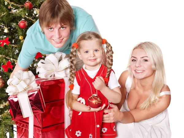 Happy family in santa hat holding gift box. — Stock Photo, Image